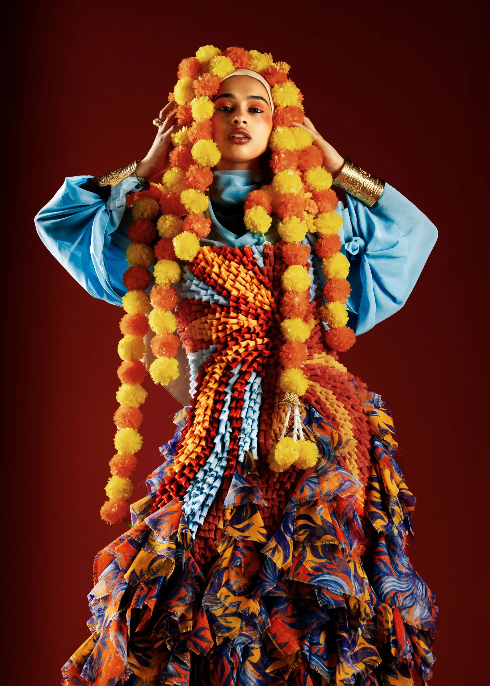 Centrefold — full marigold and tassel look on the body